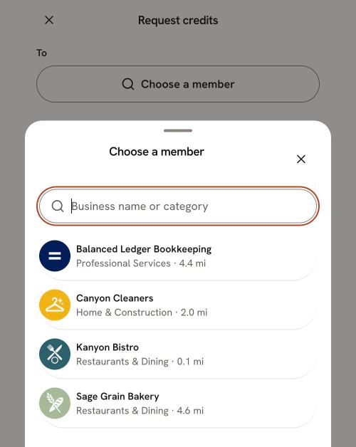 Request credits with the Choose a member sheet open, listing member businesses